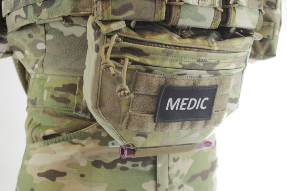 Drop down velcro utility pouch