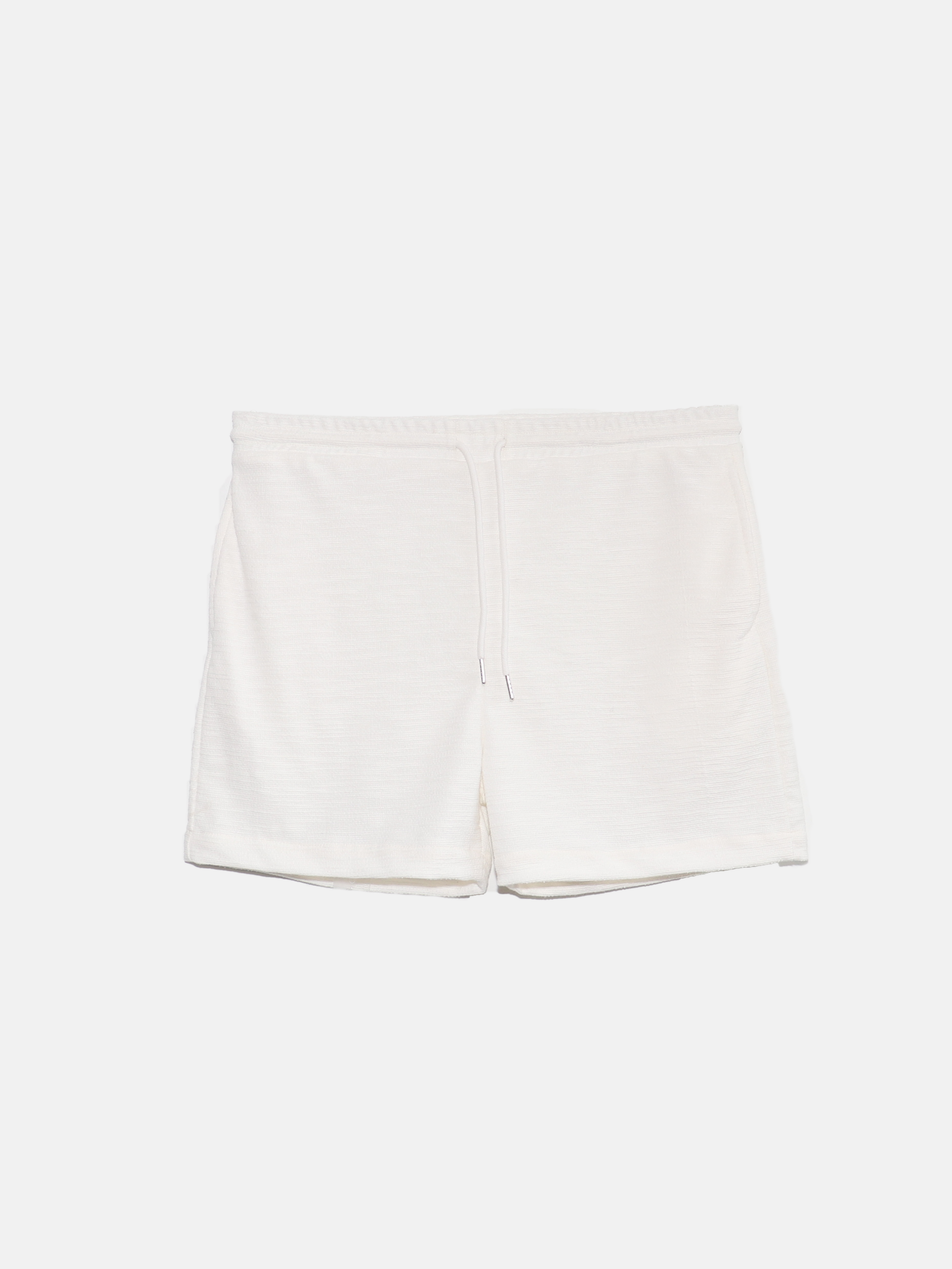 short blanc texturé