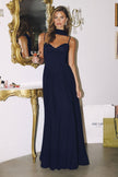 A-line gown features a strapless lace-up corset back