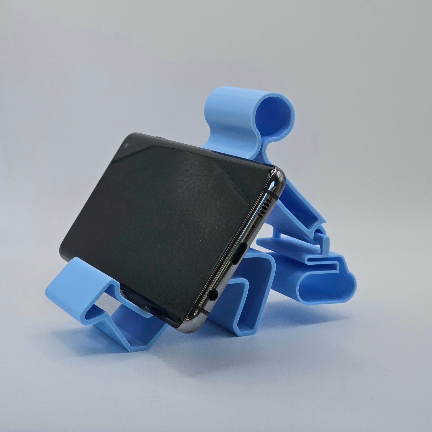 The New Cowbell - Adjustable Curling Curler Phone Stand
