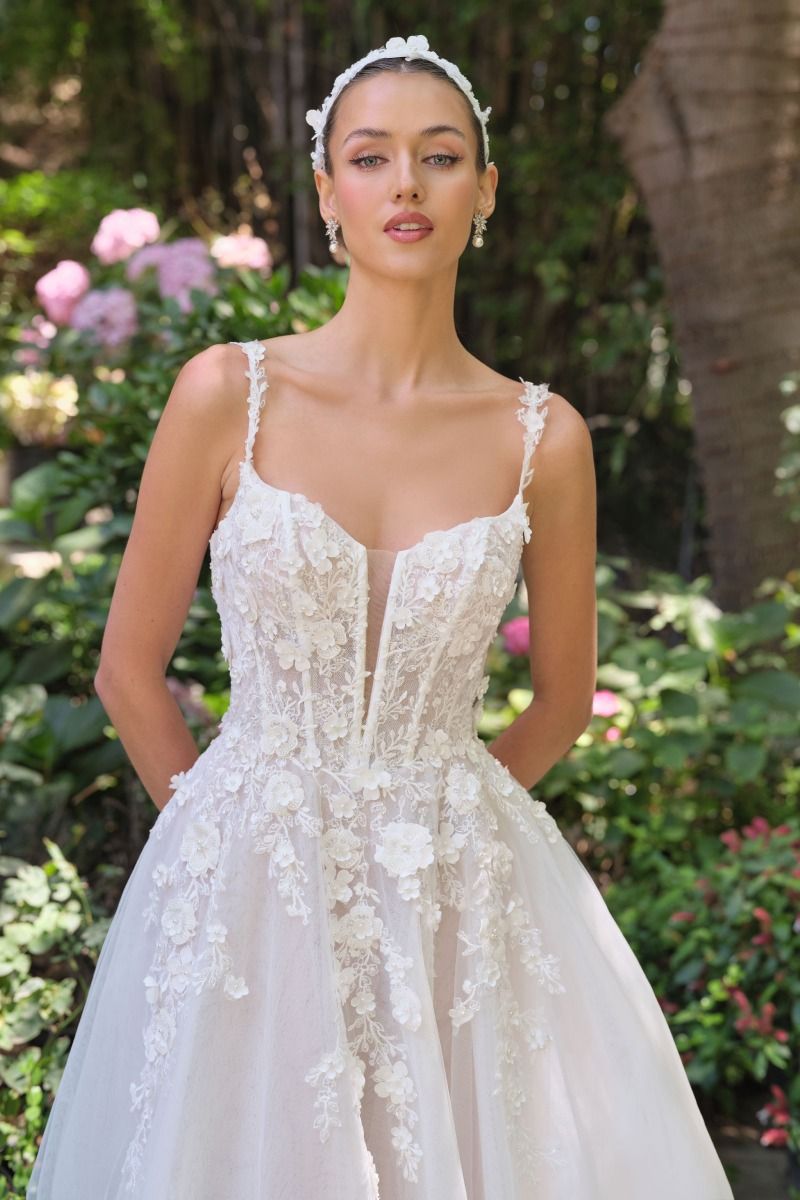 Floral lace appliqué over layered tulle