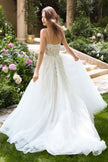 Deep neckline, beaded spaghetti straps & illusion lace corset bodice