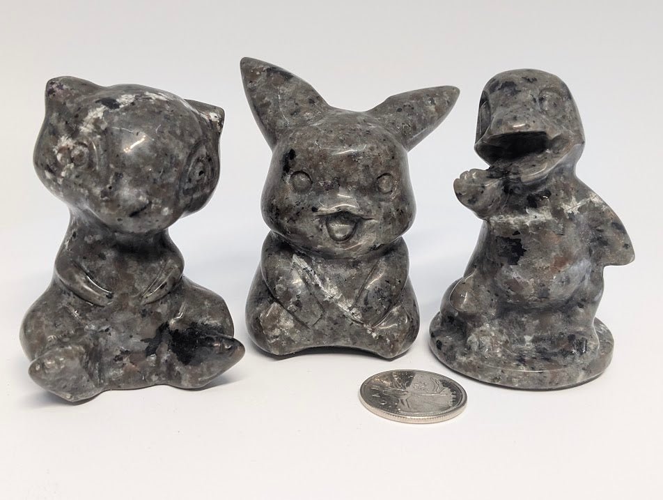 Yooperlite Pokémon‑Inspired Carvings — UV Fluorescent Crystal Figures (2.25–2.75 in, 110–295 g)